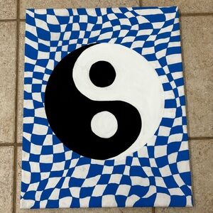 This is an Acrylic painted Canvas of a Ying Yang.